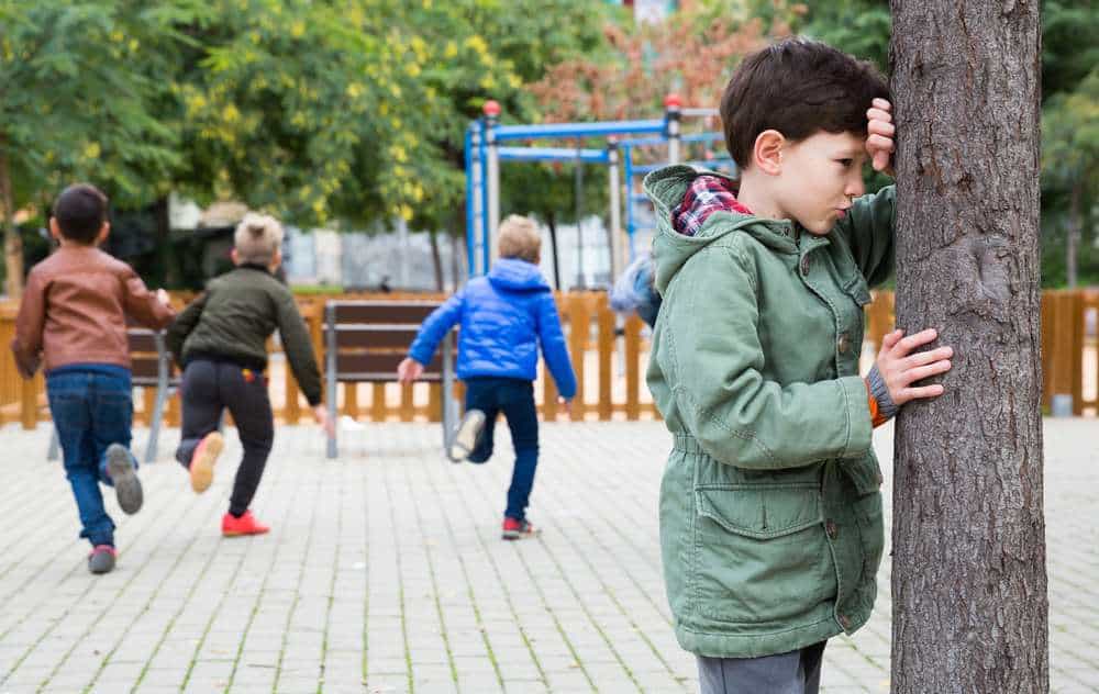 Kids playing hide and seek outside